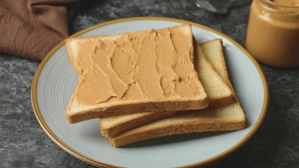 Toasted Whole Grain Bread with Peanut Butter to serve with Vegan Chocolate Banana Peanut Butter Chia Pudding Recipe
